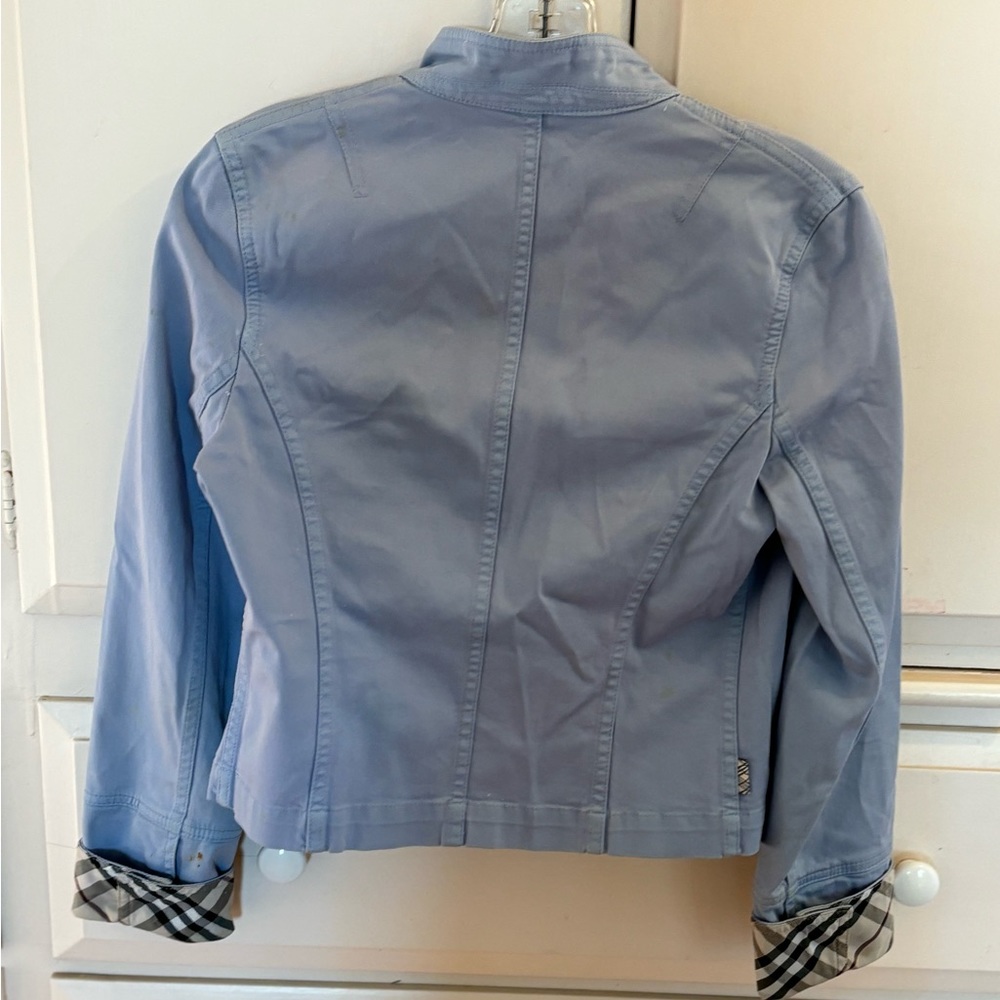 Burberry, Blue denim. In excellent condition. It’s really size 2.